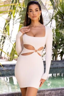 Cut Out Long Sleeve Mini Dress In Cream -Women Clothes Shop 4051 1 sunset haven cream cut open front hoop detailing long sleeve mini dress