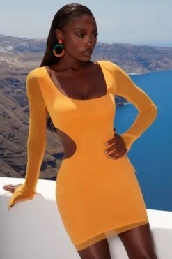 Asymmetric Long Sleeve Mini Dress In Orange