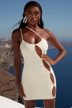 Asymmetric Cut Out Mini Dress In Ivory -Women Clothes Shop 4355 1 beach daze ivory cut out front cross over strappy mini dress 2