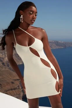 Asymmetric Cut Out Mini Dress In Ivory -Women Clothes Shop 4355 2 beach daze ivory cut out front cross over strappy mini dress 2