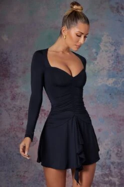 Long Sleeve Waterfall Skirt Mini Dress In Midnight Black 14 Long Sleeve Waterfall Skirt Mini Dress In Midnight Black -Women Clothes Shop 5473 2 Lili Black Long Sleeve Halter Neck Mini Dress With Waterfall Skirt