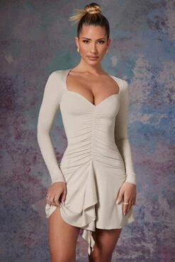 Long Sleeve Waterfall Skirt Mini Dress In Stone