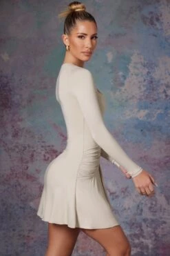 Long Sleeve Waterfall Skirt Mini Dress In Stone -Women Clothes Shop 5473 5 Lili Stone Long Sleeve Halter Neck Mini Dress With Waterfall Skirt