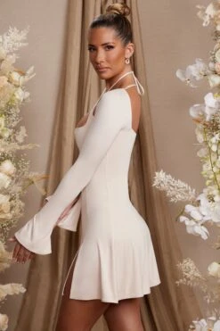 Long Sleeve Cross Over Strap Mini Dress In Cream -Women Clothes Shop 5835 7 Salome Cream Cross Over Strap Split Mini Dress